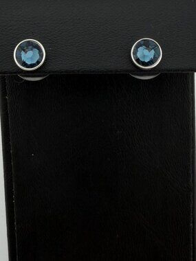 Touchstone Crystal by Swarovski Bezel Set Swizzle Stud Earrings MONTANA BLUE